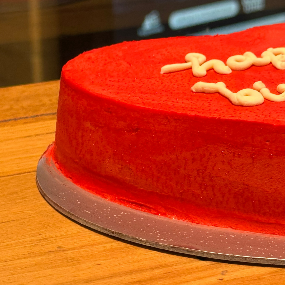 side view of a Valentine's heart cake made using Ben & Jerry's ice cream in Adelaide, showcasing its charming romantic design.